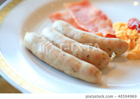 Morning sausages, bacon, scrambled eggs 48504969