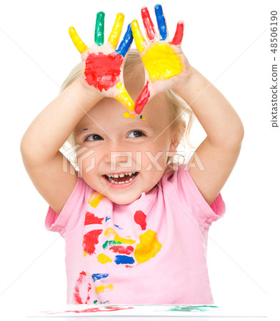 Portrait of a cute little girl playing with paints Portrait of a cute little girl playing with paints 48506190