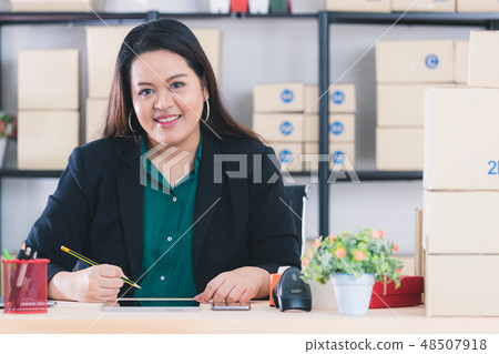 plump lady in startup office plump lady in startup office 48507918