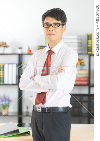 Asian business man at office Asian business man at office 48507920