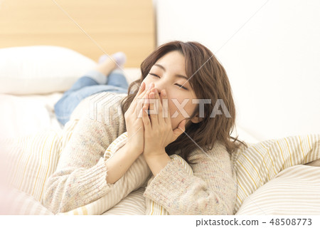 Young lady relaxing lifestyle holiday cheeks Young lady relaxing lifestyle holiday cheeks 48508773