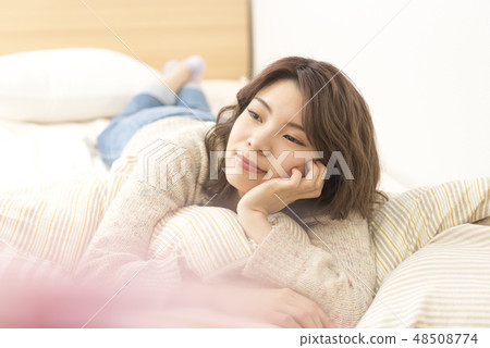 Young lady relaxing lifestyle holiday cheeks Young lady relaxing lifestyle holiday cheeks 48508774