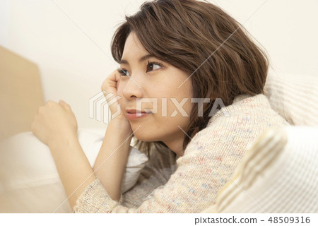 Young lady relaxing lifestyle holiday cheeks 48509316