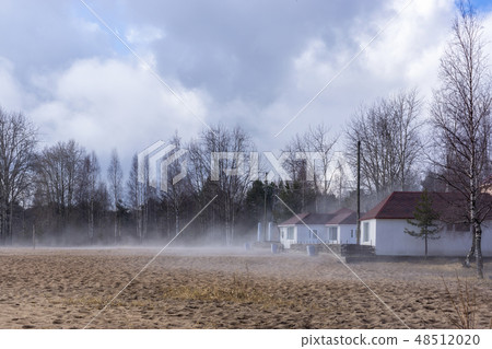 Rural houses in fog in spring Rural houses in fog in spring 48512020