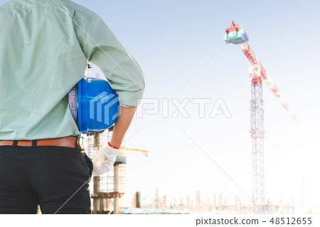 The male engineer is inspecting the building 48512655