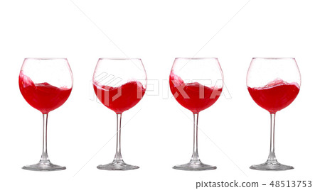 red wine splashing in a glass, isolated on white red wine splashing in a glass, isolated on white 48513753