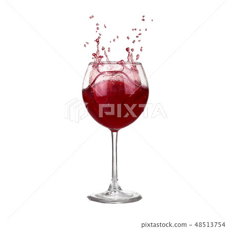red wine pouring into wine glass isolated red wine pouring into wine glass isolated 48513754