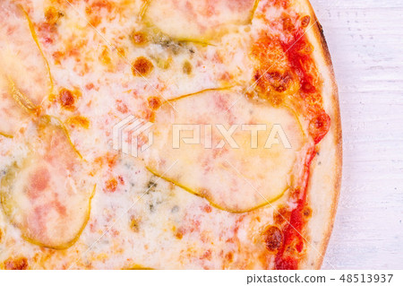 Fragment of pizza with pear and cheese Fragment of pizza with pear and cheese 48513937