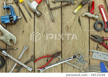 Set of tools on wooden background  48514266