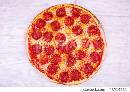 Salami tomato sauce pizza, salami and oregano 48514281