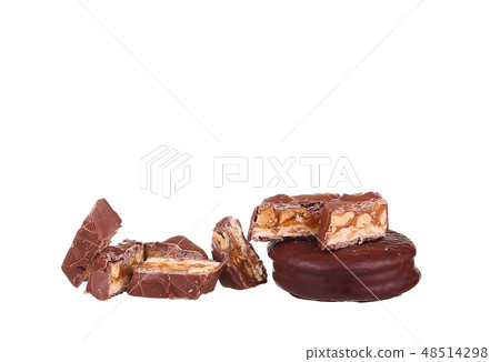 Tasty chocolate bar split in two pieces.  48514298