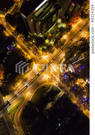 Aerial view of highway junctions shape letter x cross at night. 48514384