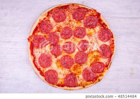 Sausage and cheese pizza in tomato sauce 48514484