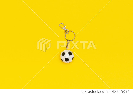 Keychain with soccer or football ball on yellow  48515055