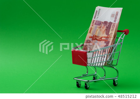 Paper money in a basket shot on chroma key Paper money in a basket shot on chroma key 48515212