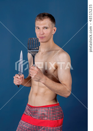 Handsome sexy chef with apron on naked body  48515235