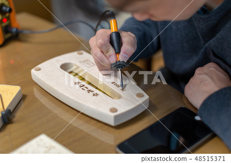 Wood burning 48515371