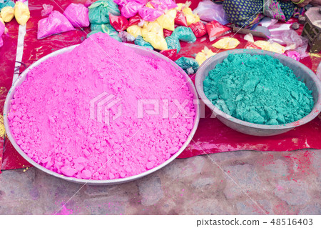 Bags of colored powdered paint sit waiting to be sold to Holi Festival celebrants Bags of colored powdered paint sit waiting to be sold to Holi Festival celebrants 48516403