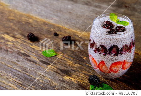Chia pudding with fresh raspberries and strawberry Chia pudding with fresh raspberries and strawberry 48516705