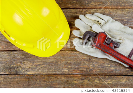 Safety helmet and gloves wrench construction Safety helmet and gloves wrench construction 48516834