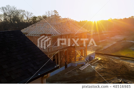 New residential construction house framing against New residential construction house framing against 48516985