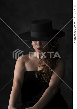 girl with black spanish hat girl with black spanish hat 48517169