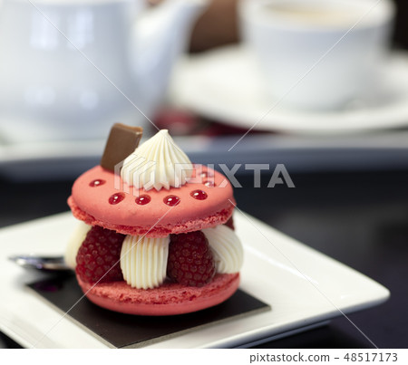 colorful strawberry biscuit on black table colorful strawberry biscuit on black table 48517173