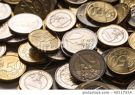 A pile of new euro coins in other compositions. 48517934