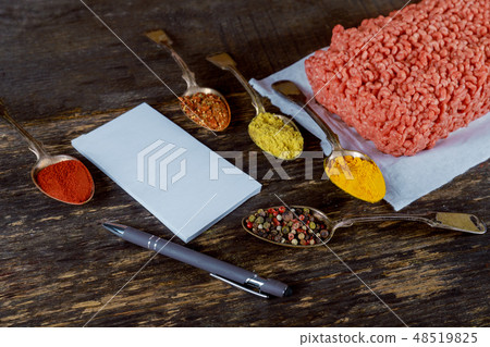 Raw minced meat beef with various spices Raw minced meat beef with various spices 48519825