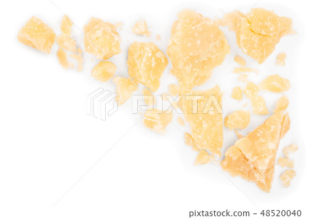 Parmesan cheese pieces isolated on white background with copy space for your text. Closeup. Top view Parmesan cheese pieces isolated on white background with copy space for your text. Closeup. Top view 48520040
