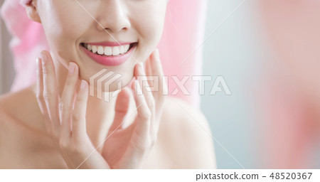 woman look her teeth woman look her teeth 48520367