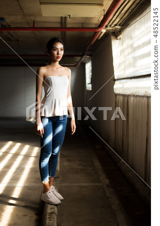 Asian Fitness woman warm up ballet dance stretch 48522145