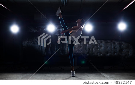 Asian Fitness woman warm up ballet dance stretch 48522147