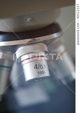 Microscope lens closeup Microscope lens closeup 48522337