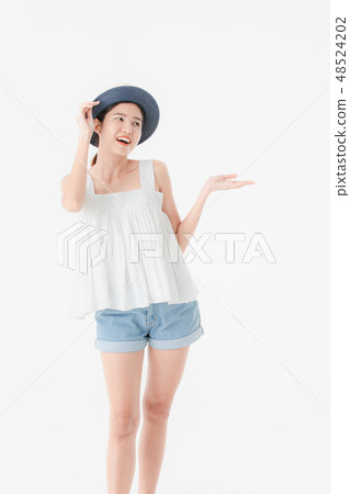 Young lady in casual summer outfits Young lady in casual summer outfits 48524202