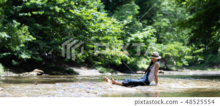 Women playing on the river 48525554
