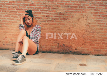 Depressed teenage woman feeling sad and lonely. Depressed teenage woman feeling sad and lonely. 48525929