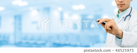 Doctor pointing pen at empty space for your text. 48525973