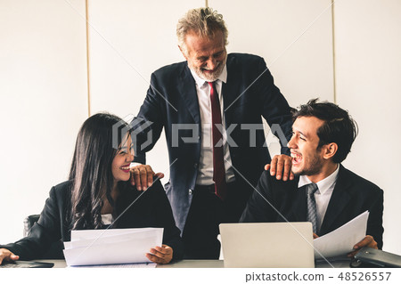 Business people, manager and employee in meeting. 48526557