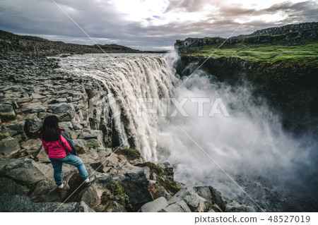 Traveler Travels to Dettifoss Waterfall in Iceland Traveler Travels to Dettifoss Waterfall in Iceland 48527019