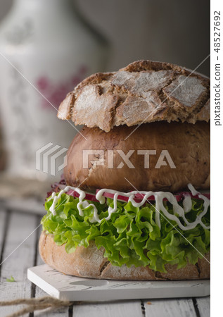Portobello burger, homemade bun and lettuce 48527692