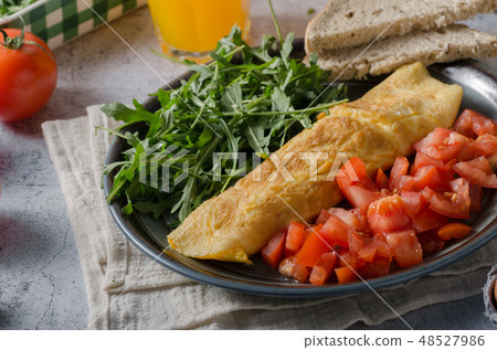 Egg omelette with salad Egg omelette with salad 48527986