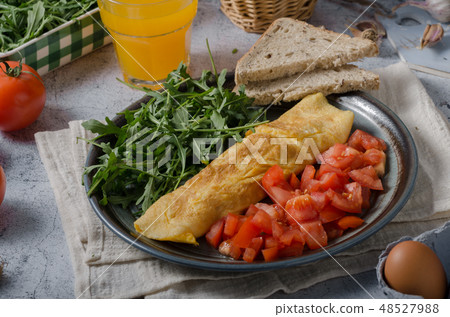 Egg omelette with salad 48527988