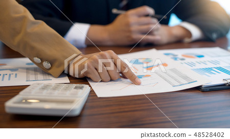 businessman and businesswoman work meeting and consult businessman and businesswoman work meeting and consult 48528402