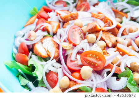 Salad with grilled chicken, cherry tomatoes, corn salad, chick p Salad with grilled chicken, cherry tomatoes, corn salad, chick p 48530678