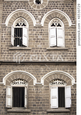 Windows in the old part of Pune, Maharashtra India Windows in the old part of Pune, Maharashtra India 48530729
