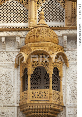 Carved window on temple, Pune, Maharashtra, India Carved window on temple, Pune, Maharashtra, India 48530731