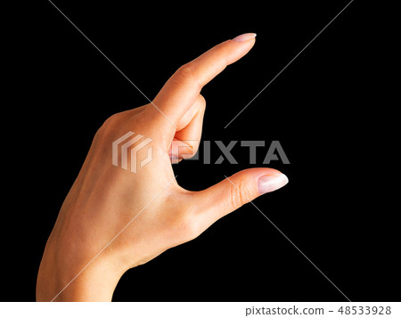 Woman hand showing picking up pose or holding Woman hand showing picking up pose or holding 48533928