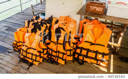 Group of life jacket on boat with tip box 48536593