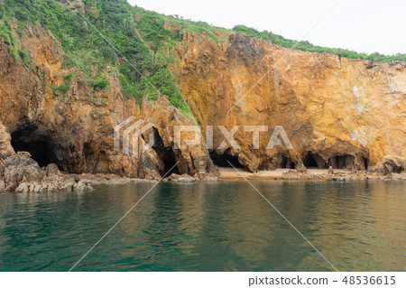 Cave on cliff island and sea Cave on cliff island and sea 48536615